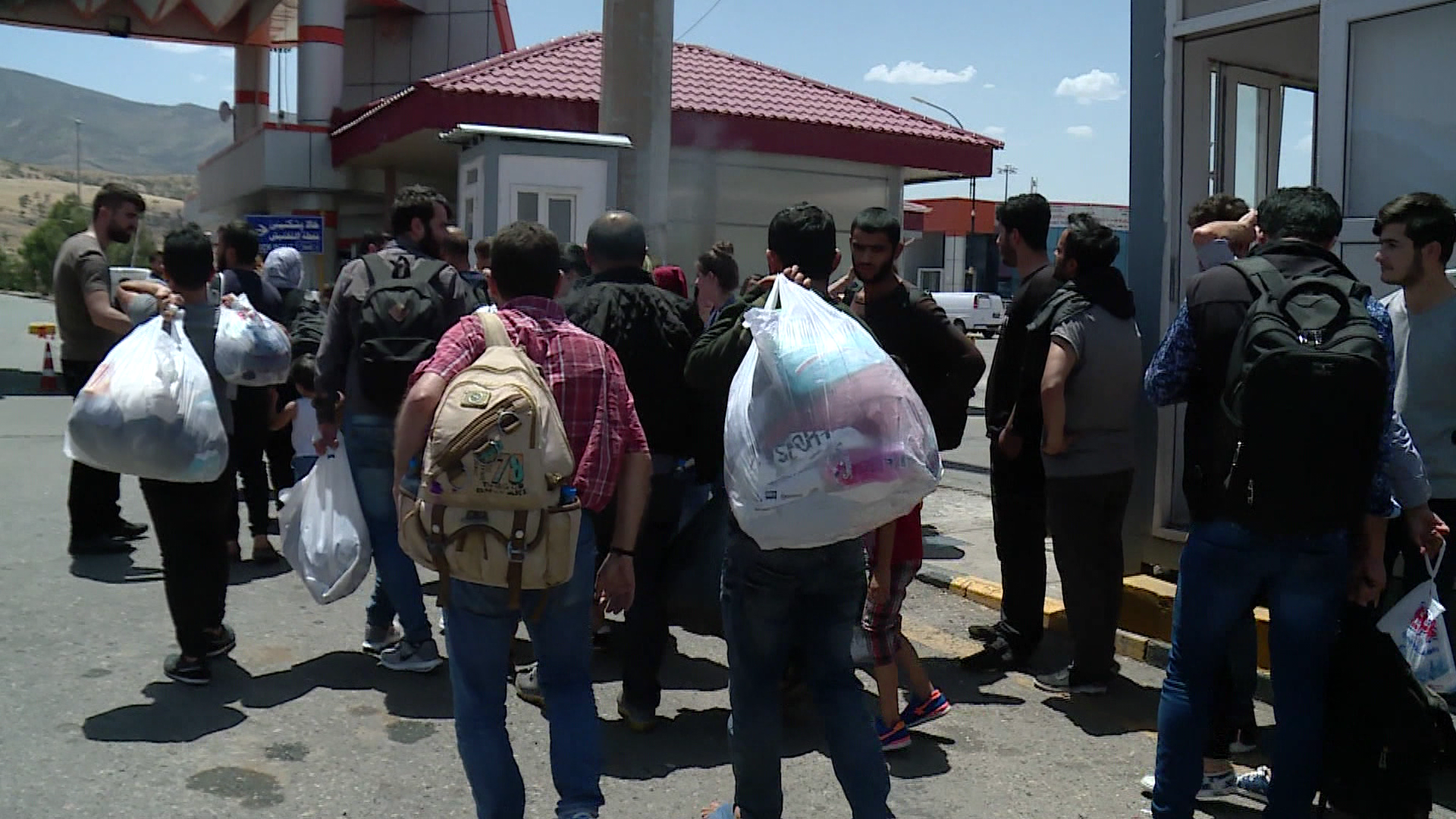 Kurdish and Iraqi migrants being deported from the Turkish border to the Kurdistan Region, June 12, 2018. (Photo: Kurdistan 24)